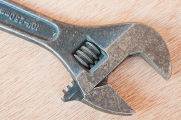 the wrench on wood background