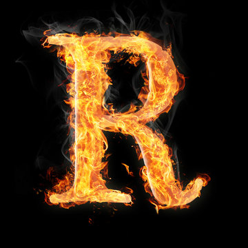 Fonts and symbols in fire on black background - R