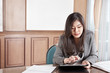 © Arto - Businesswoman and tablet