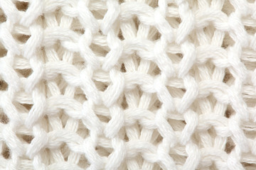 White sweater knitted texture close up; original background