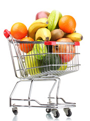 Assortment of exotic fruits  in shopping cart isolated on white