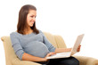 © lenets_tan - pregnant female with laptop
