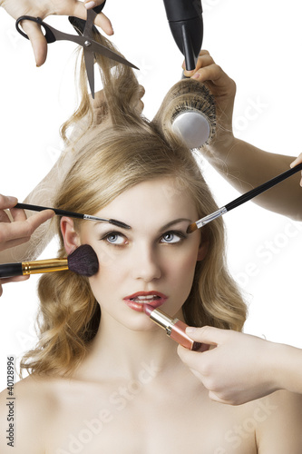 Naklejka na szafę in beauty salon, the girl looks up at right