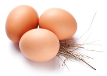 Eggs With A Straw On A White Background.