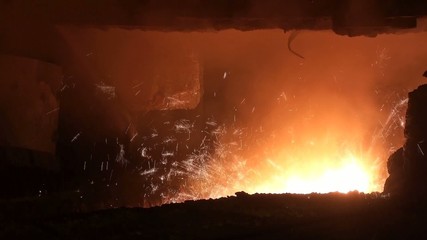 Wall Mural - Smelting of liquid metal from blast furnace