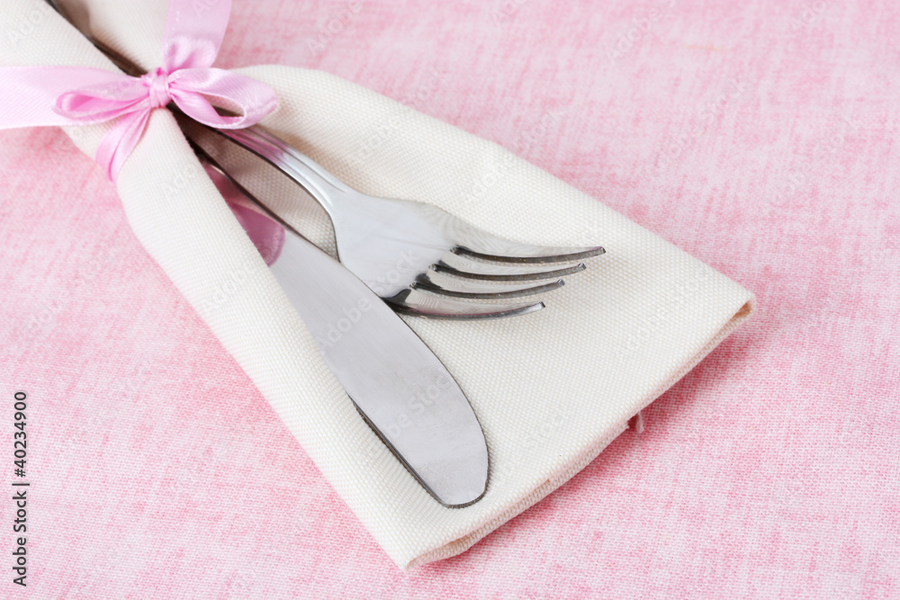 fork and knife on napkin close up