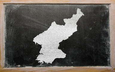 outline map of north korea on blackboard