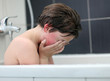 © Denizo - Teen boy experiencing a problem in the bathroom