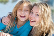 © atikinka2 - portrait of a happy mother and her little daughter