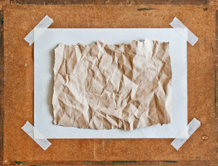 Empty brown Crumpled paper on Particle board background