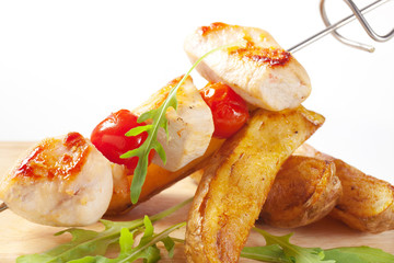 Wall Mural - Chicken skewer and potato wedges