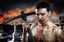 Male Zombie In A Cemetery, Undertaker With Pick Axe