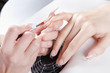 Manicure. Master make nail extension