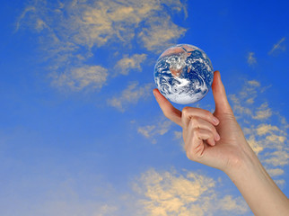 Wall Mural - Planet earth in fingers.Elements of this image furnished by NASA