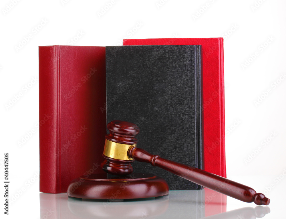 Judge's gavel and books isolated on white