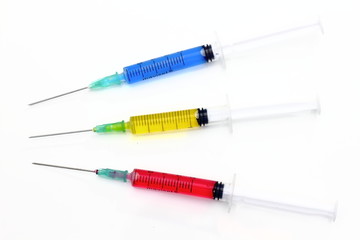 colorful injectors and medicine