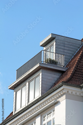 Dachgaube mit Terrasse Stock-Foto | Adobe Stock