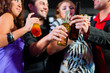 © Kzenon - People with cocktails in bar or club