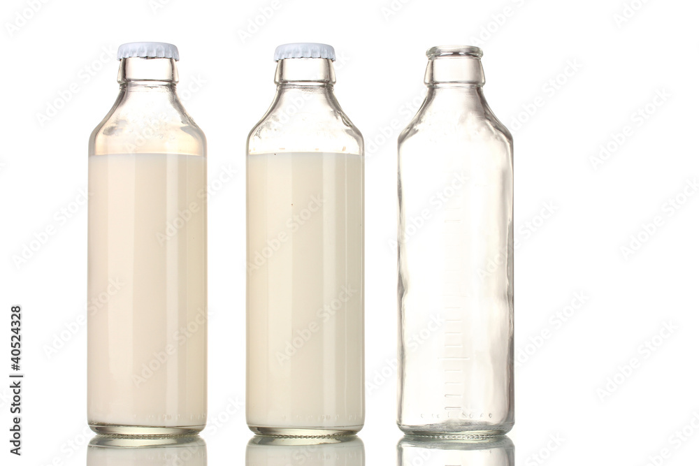 Bottle of milk and an empty bottle isolated on white