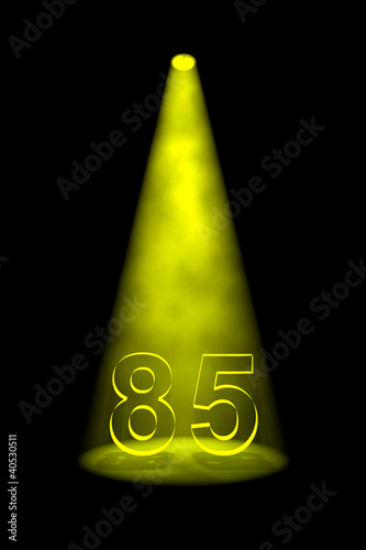 Fotografia Number 85 illuminated with yellow spotlight