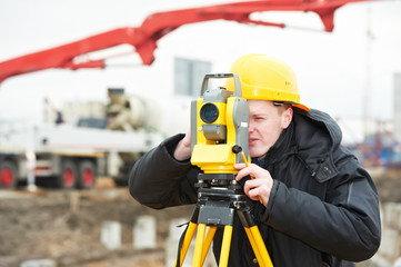 surveyor works with theodolite