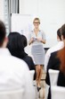 © .shock - business woman giving presentation