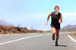 Man running / sprinting on road