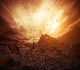 Wall Mural - Dramatic sky over rocks.