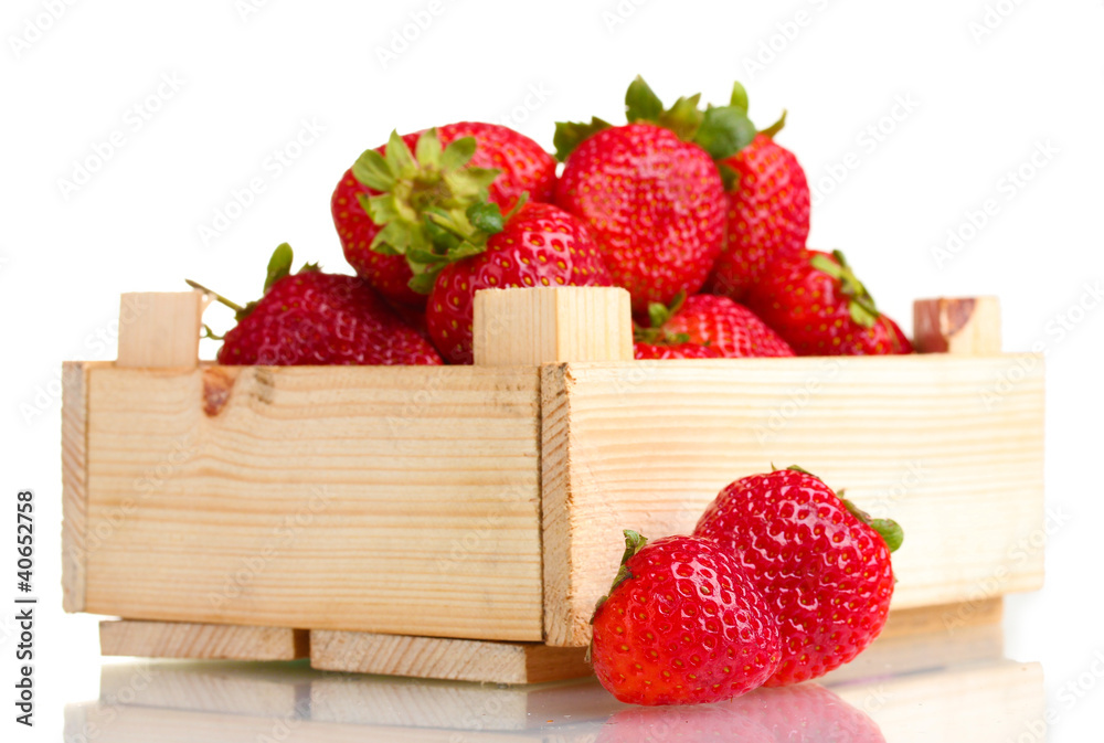 Strawberries in wooden box isolated on white