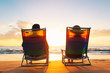 © EpicStockMedia - Happy Romantic Couple Enjoying Beautiful Sunset at the Beach