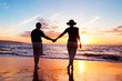 © EpicStockMedia - Senior Couple Enjoying Sunset at the Beach