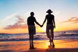 © EpicStockMedia - Senior Couple Enjoying Sunset at the Beach