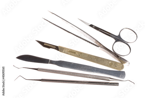 Fotomural scalpel and other medical instruments isolated on white, no shad