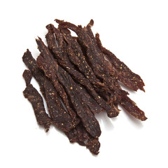 Wall Mural - South African biltong strips  isolated on a white background