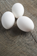 Eggs On Wooden Background
