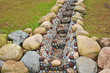 Decorated Water  Drain In The Garden