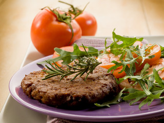 Sticker - soy steak with arugua and tomatoes salad