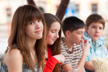 Wall Mural - Portrait of teenage girl having fun outdoor with her friends