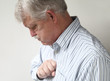 senior man suffers from bad heartburn