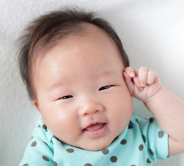 smile face close up of a cute baby