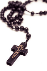 Brown rosary with crucifix - isolated