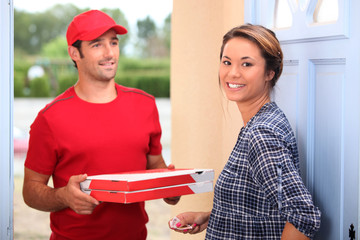 young man delivering pizza