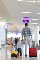 Canvas Print - father and son at the airport