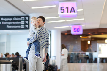 Canvas Print - father and son at the airport