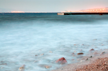 Canvas Print - pier in Red Sea at late evening near Aqaba town