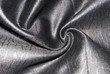 Glossy silk fabric texture of the black color