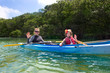 © Brocreative - Young Girl Kayaking in tropical mangroves