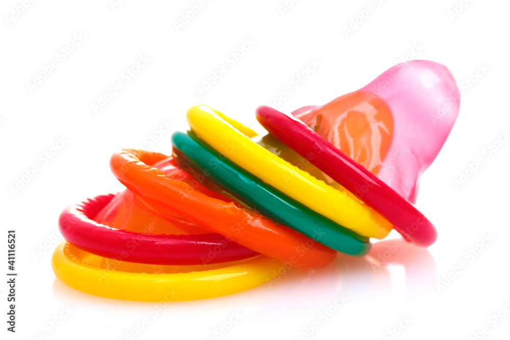 Colorful condoms isolated on white