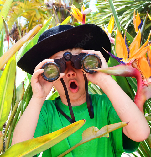 explorer boy with binoculars