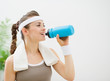 © Alliance - Fitness woman drinking water